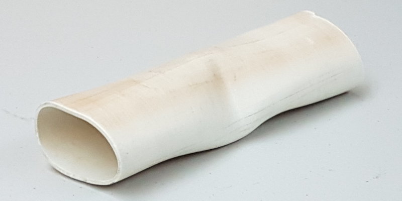 PVC pipe after heating it and bending and squashing it to the desired shape